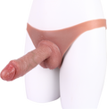 Cieliste majtki z dildo widoczne z boku
