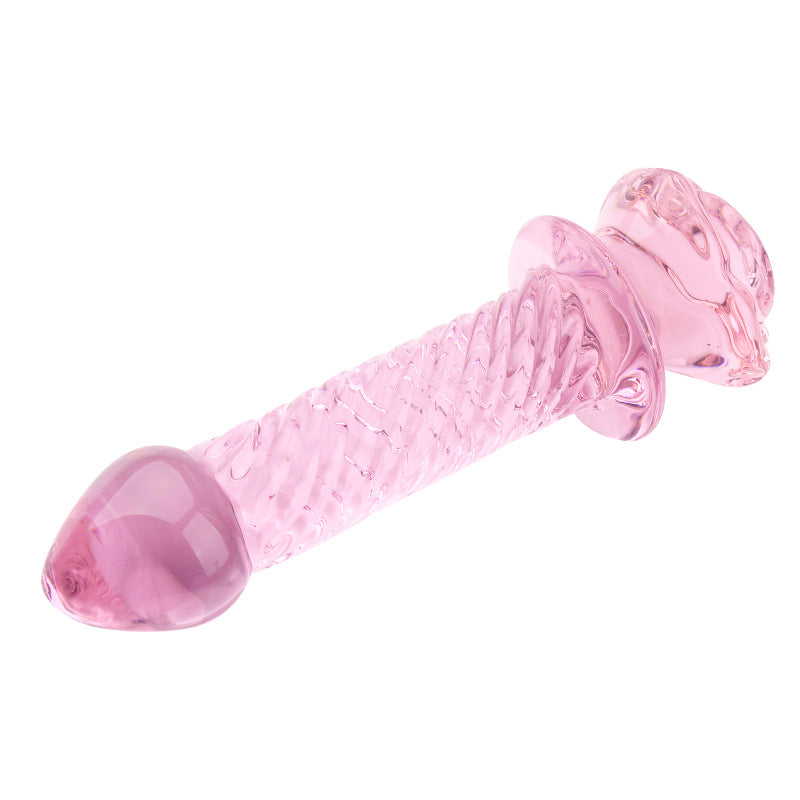Różowe szklane dildo z różą — zbliżenie spiralnej faktury