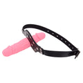 Różowy dildo mouth gag z regulowanym paskiem — widok ukośny uprzęży