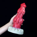 Czerwone dildo z podwójnym węzłem i przyssawką