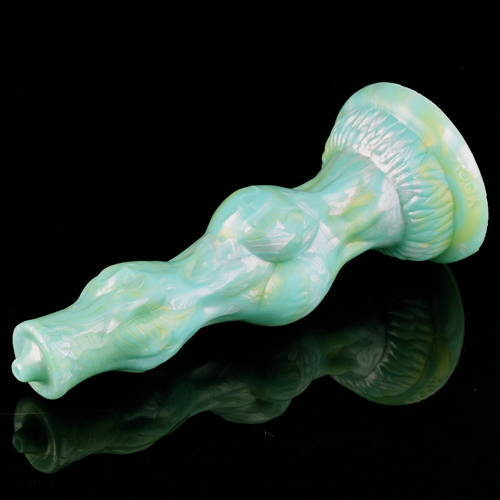 Dolny węzeł i fakturowana podstawa zielonego dildo