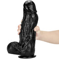 Przyssawka u podstawy grubego dildo